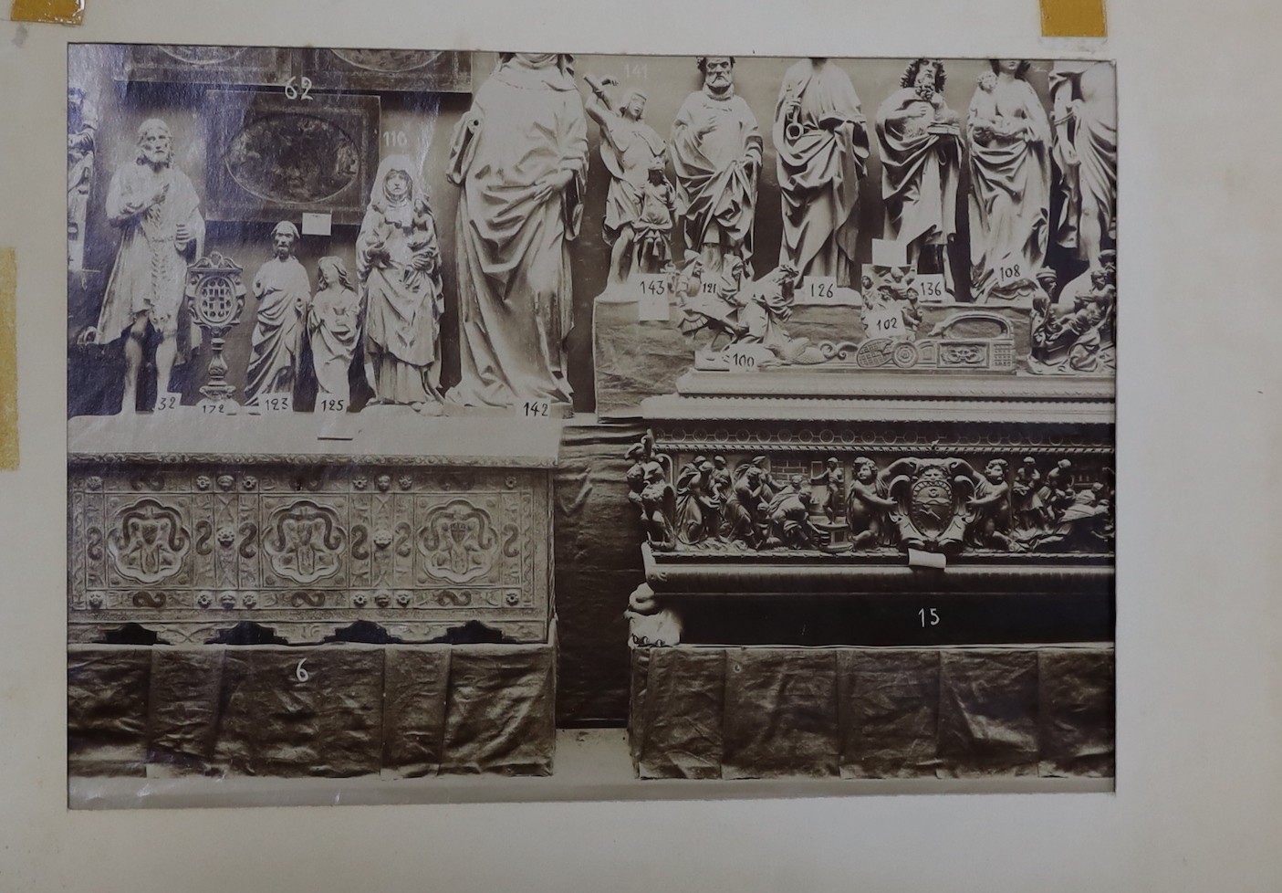 G. Borelli of Rome. A folio of photographs of antiquities and historical artefacts, together with an etching by Hedley Fitton, overall 49 x 38cm